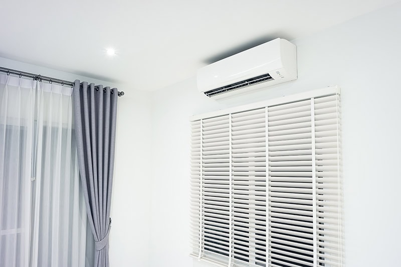 Ductless unit installed inside of a modern home in the living room.